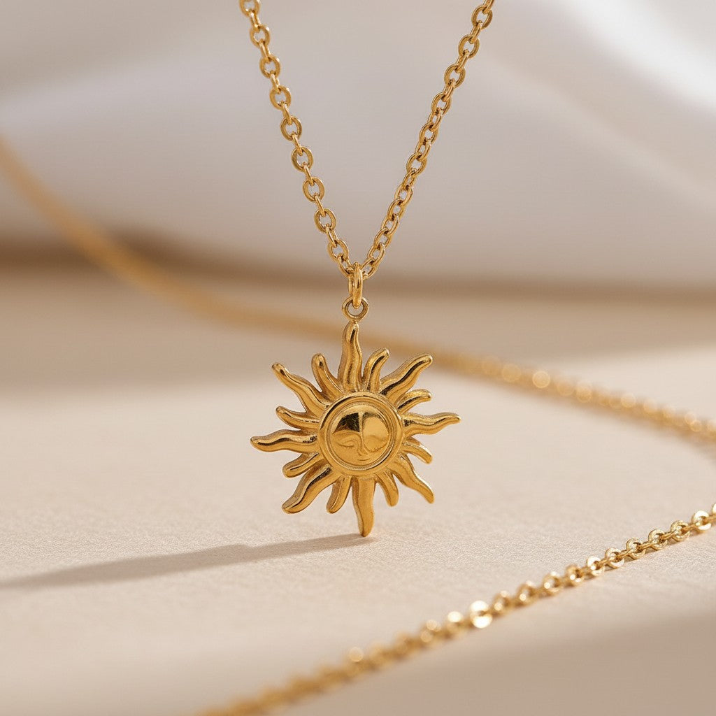 PRO RAY gold sun pendant necklace with delicate chain, 17mm pendant, 39cm chain. Refined statement jewelry.