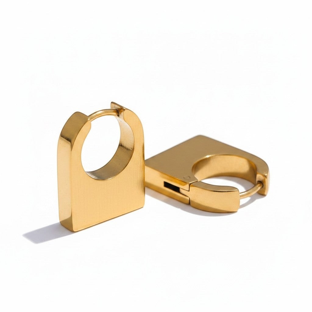 PRO RAY KAIA sculptural rectangular gold hoop earrings with polished finish and architectural silhouette.