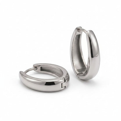 PRO RAY ARIA Hoops: polished silver sculptural huggie earrings, 23mm diameter, for everyday wear.