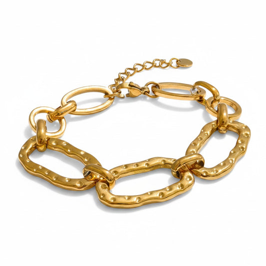 PRO RAY AUREVA gold chain bracelet with textured sculptural oval links and adjustable clasp. Modern statement jewelry.