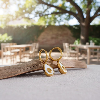 PRO RAY gold hoop earrings with avocado-shaped natural shell drop. Delicate statement jewelry.