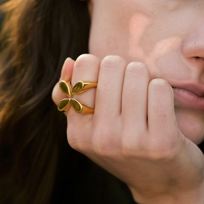 PRO RAY gold open ring with petal-inspired shapes and sculptural silhouette, polished finish.
