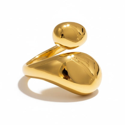 PRO RAY ELORIA gold sculptural open ring with smooth organic curves and a bold polished silhouette.