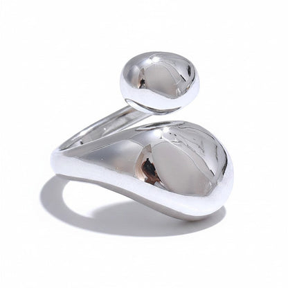 PRO RAY ELORIA open ring with smooth organic curves and a bold polished silver silhouette. Modern minimalist design.