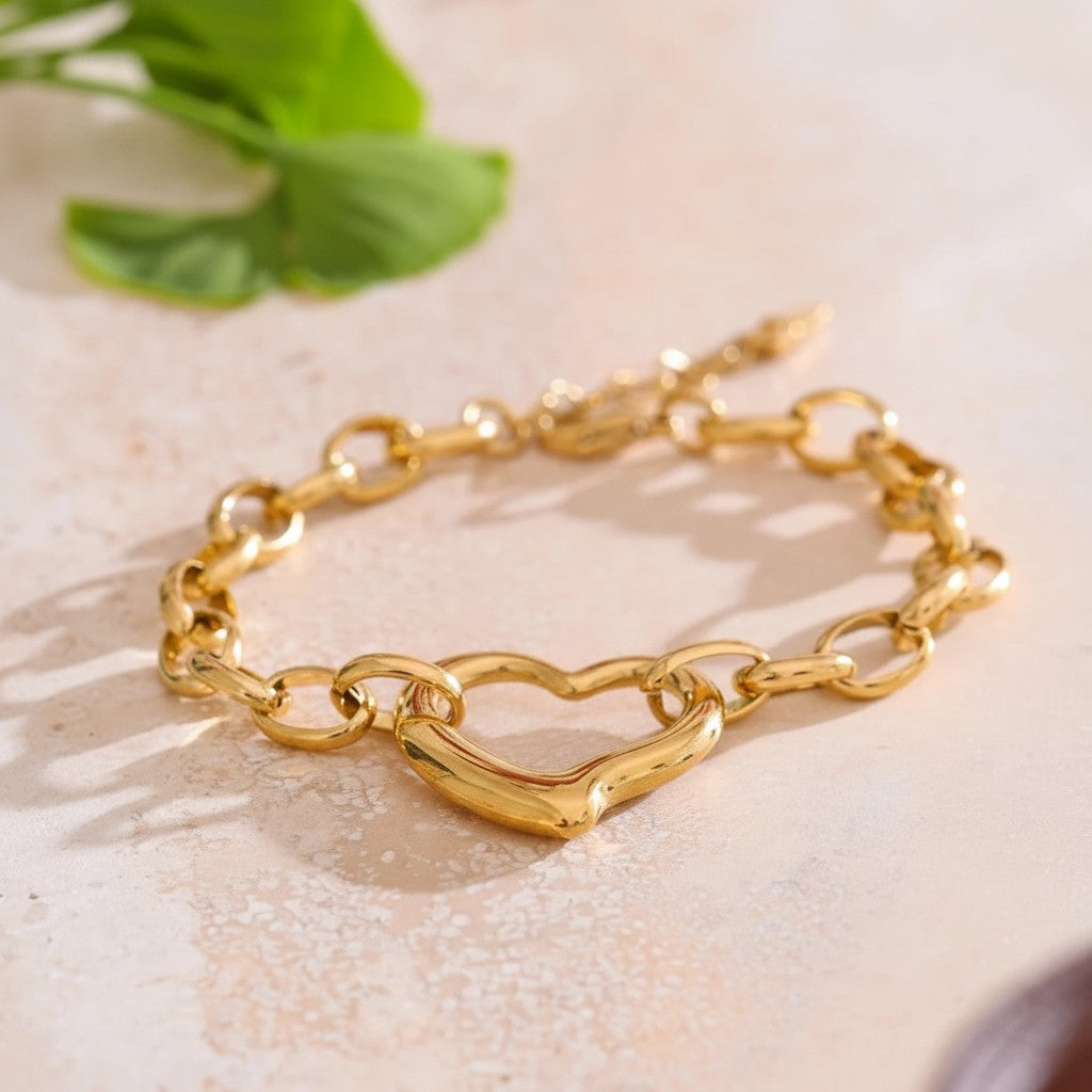 PRO RAY gold sculptural heart chain bracelet with bold detailing, 19cm + 4cm adjustable length.