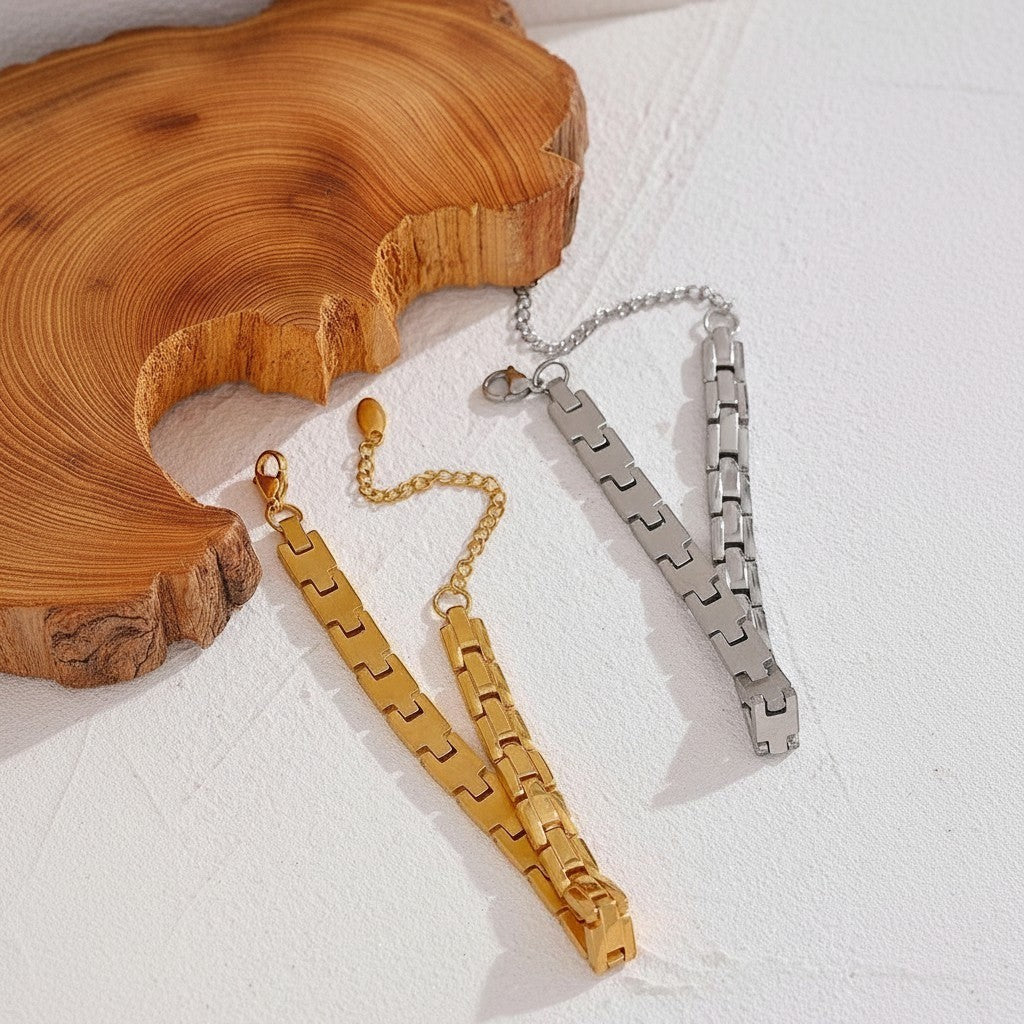 PRO RAY KAELIS geometric link chain bracelet in gold and silver tones. Modern minimalist design.