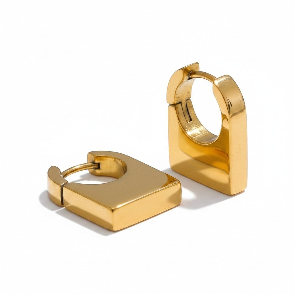 PRO RAY KAIA sculptural rectangular gold hoop earrings with polished finish.