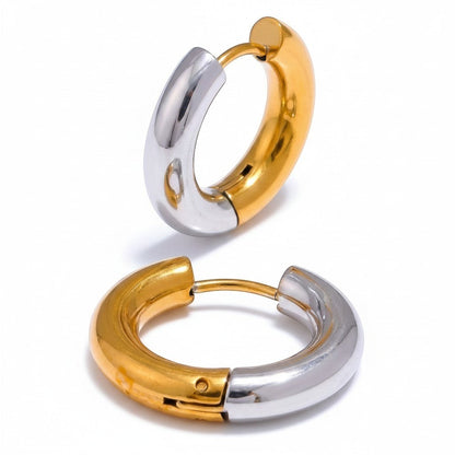 PRO RAY LIORA two tone hoop earrings in polished gold and silver finish. Smooth rounded silhouette, 20mm diameter.