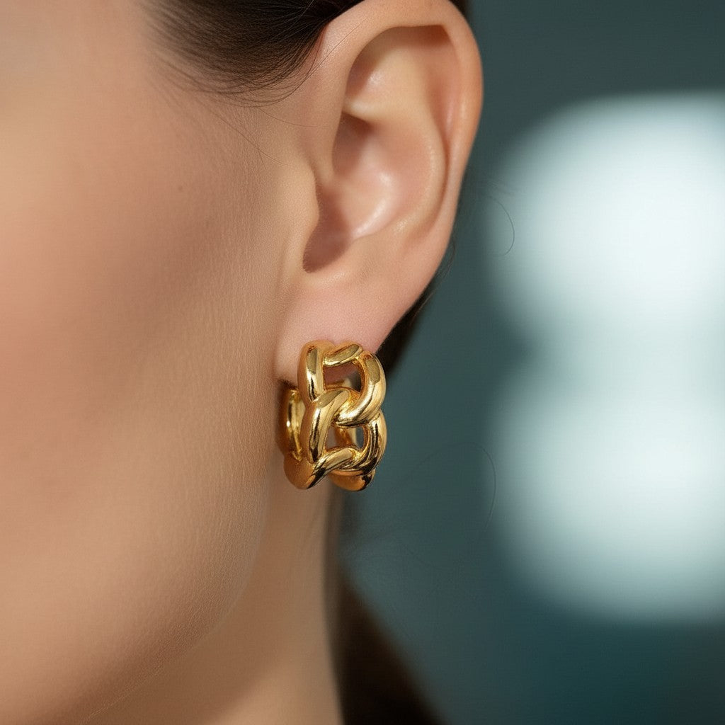 PRO RAY LYRA chunky gold chain-inspired hoop earrings with a bold sculptural design.