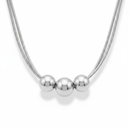 PRO RAY NOVA Necklace with three polished silver beads on a double snake chain. Modern, refined jewelry.