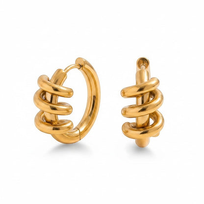 PRO RAY gold sculptural spiral hoop earrings with a polished finish and fluid silhouette.