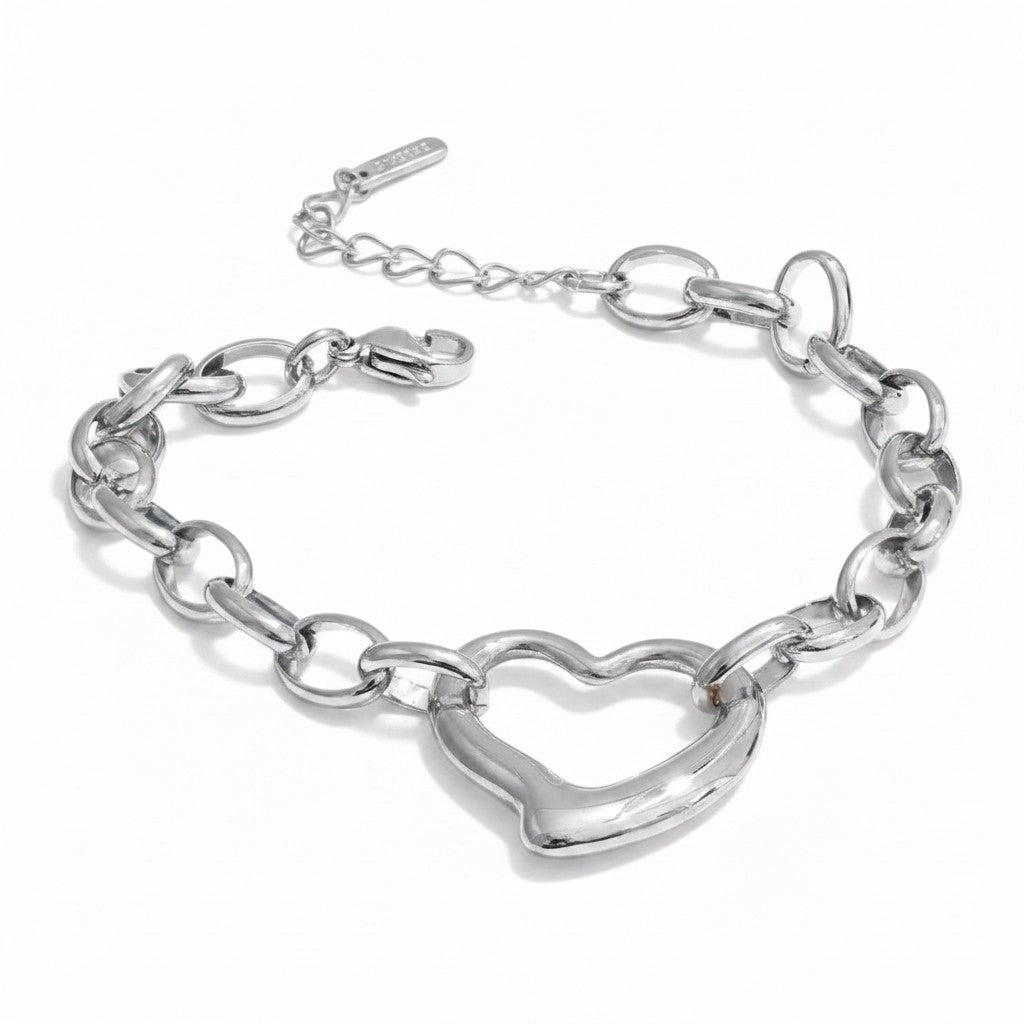 PRO RAY sculptural silver-tone metal heart chain bracelet with bold detailing. Adjustable length.