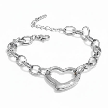 PRO RAY sculptural silver-tone metal heart chain bracelet with bold detailing. Adjustable length.