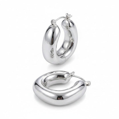 PRO RAY SOREYA sculptural silver-tone metal hoop earrings with a smooth, curved form. Diameter 30mm.