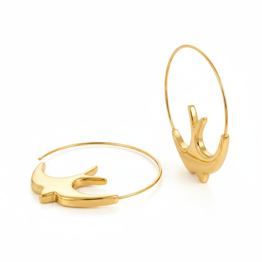 PRO RAY silver hoop earrings with sculptural swallow design, 44mm diameter.