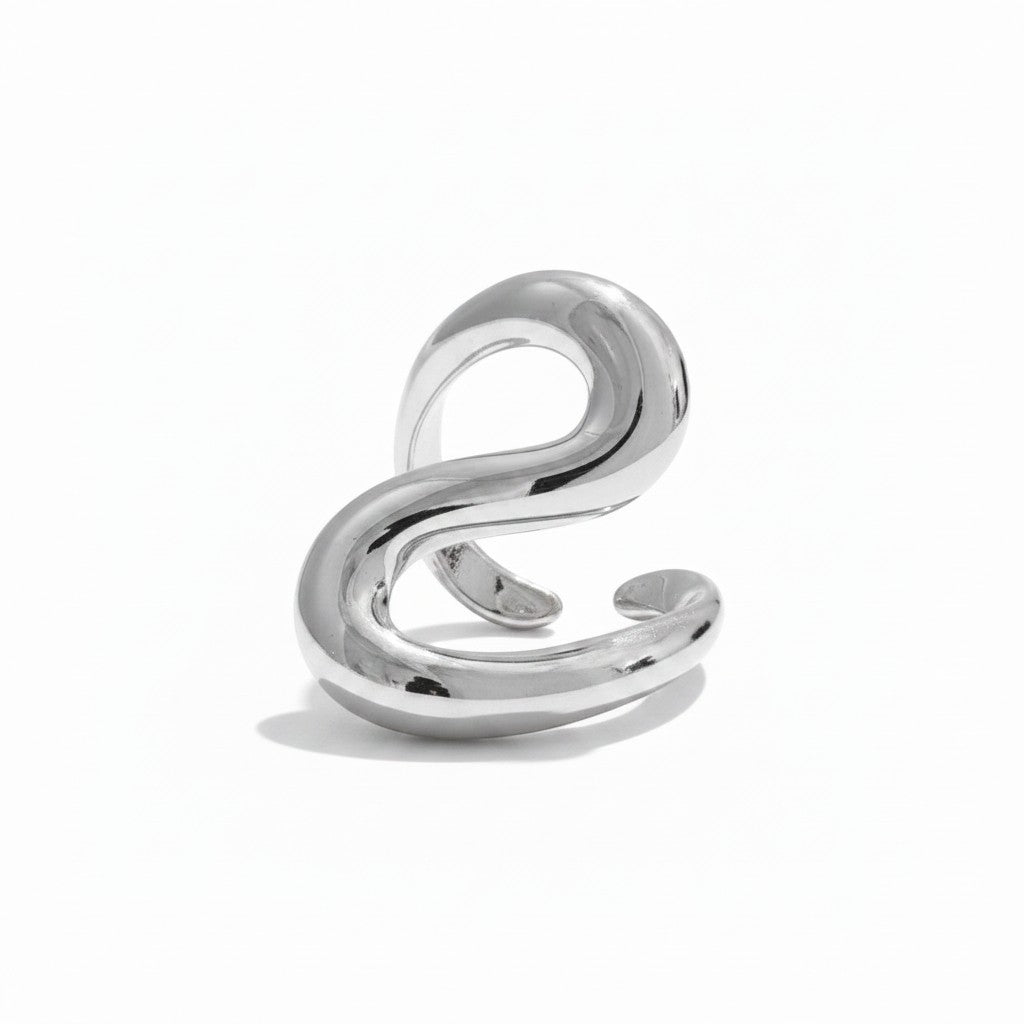 PRO RAY SORELLE open ring with fluid curved lines in a silver-tone metal. Modern sculptural design.