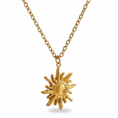PRO RAY gold sun pendant necklace with a sculptural silhouette and delicate detailing. Adjustable chain length.