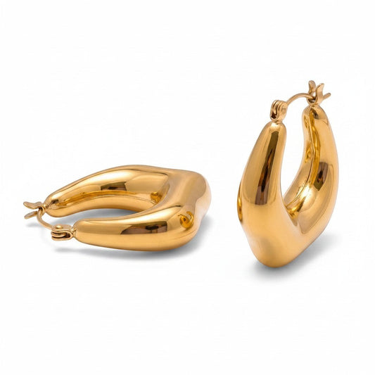 PRO RAY VIONA sculptural gold hoop earrings with organic shape and polished finish, 30mm diameter.