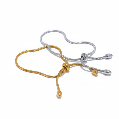 PRO RAY ZARELIA adjustable snake chain bracelet in gold and silver tones, minimalist design.