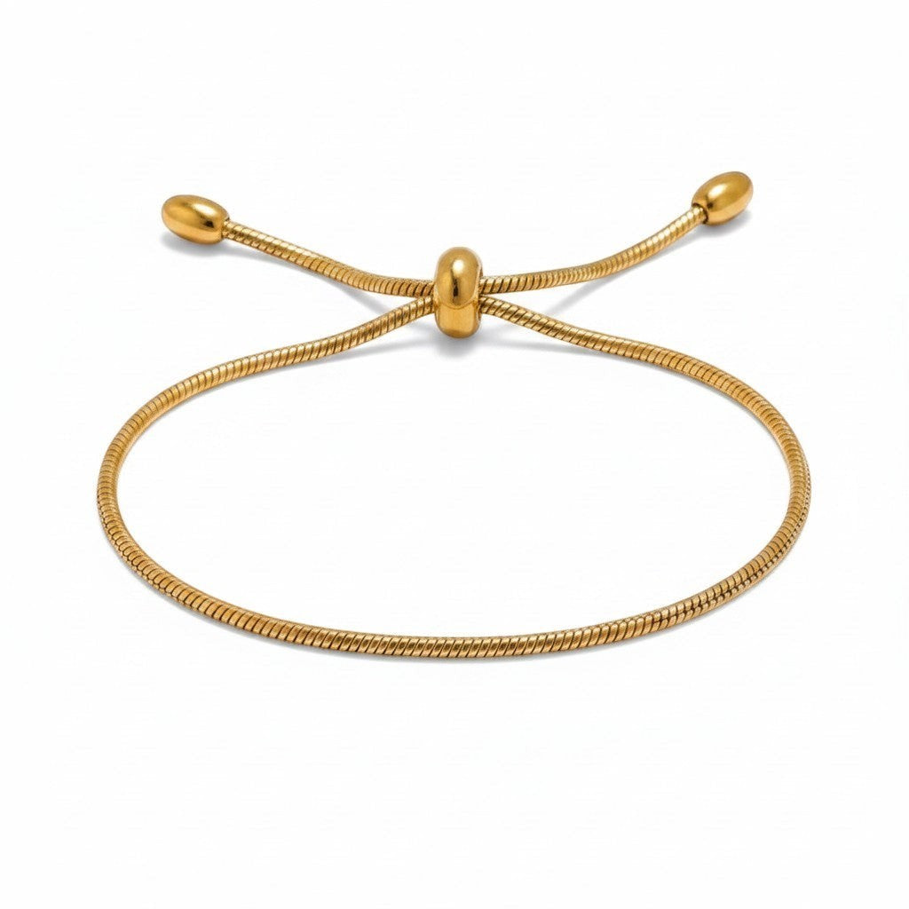PRO RAY ZARELIA gold snake chain bracelet with adjustable slider and bead detail.