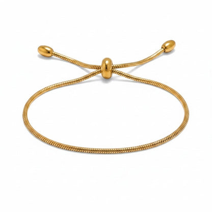 PRO RAY ZARELIA gold snake chain bracelet with adjustable slider and bead detail.