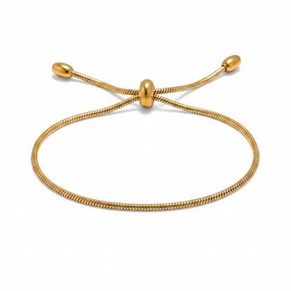 PRO RAY ZARELIA gold snake chain bracelet with adjustable slider and bead detail.