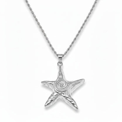 PRO RAY ZOREYA silver-tone star pendant necklace with rope chain, featuring sculptural detailing and a central spiral.