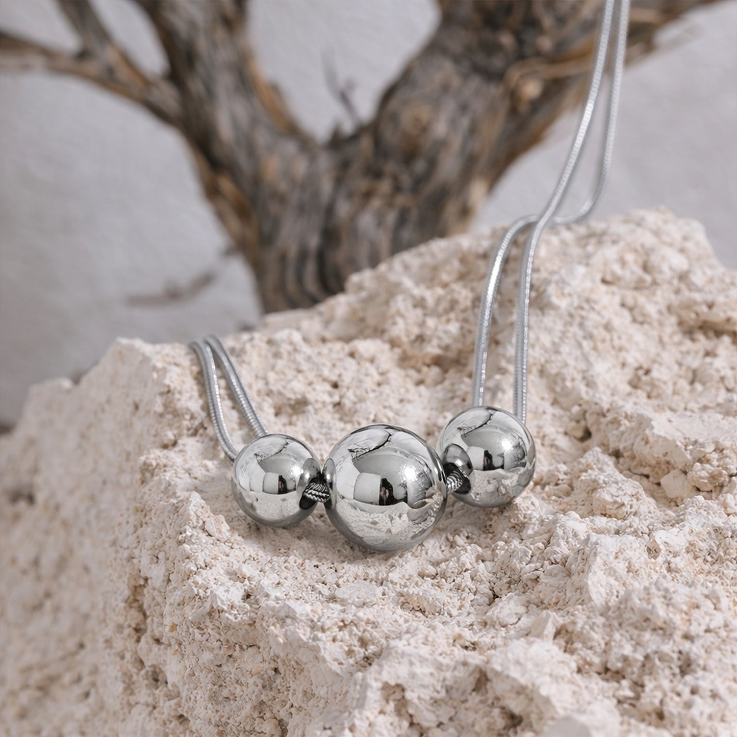 PRO RAY NOVA silver necklace lifestyle studio shot minimalist bead necklace