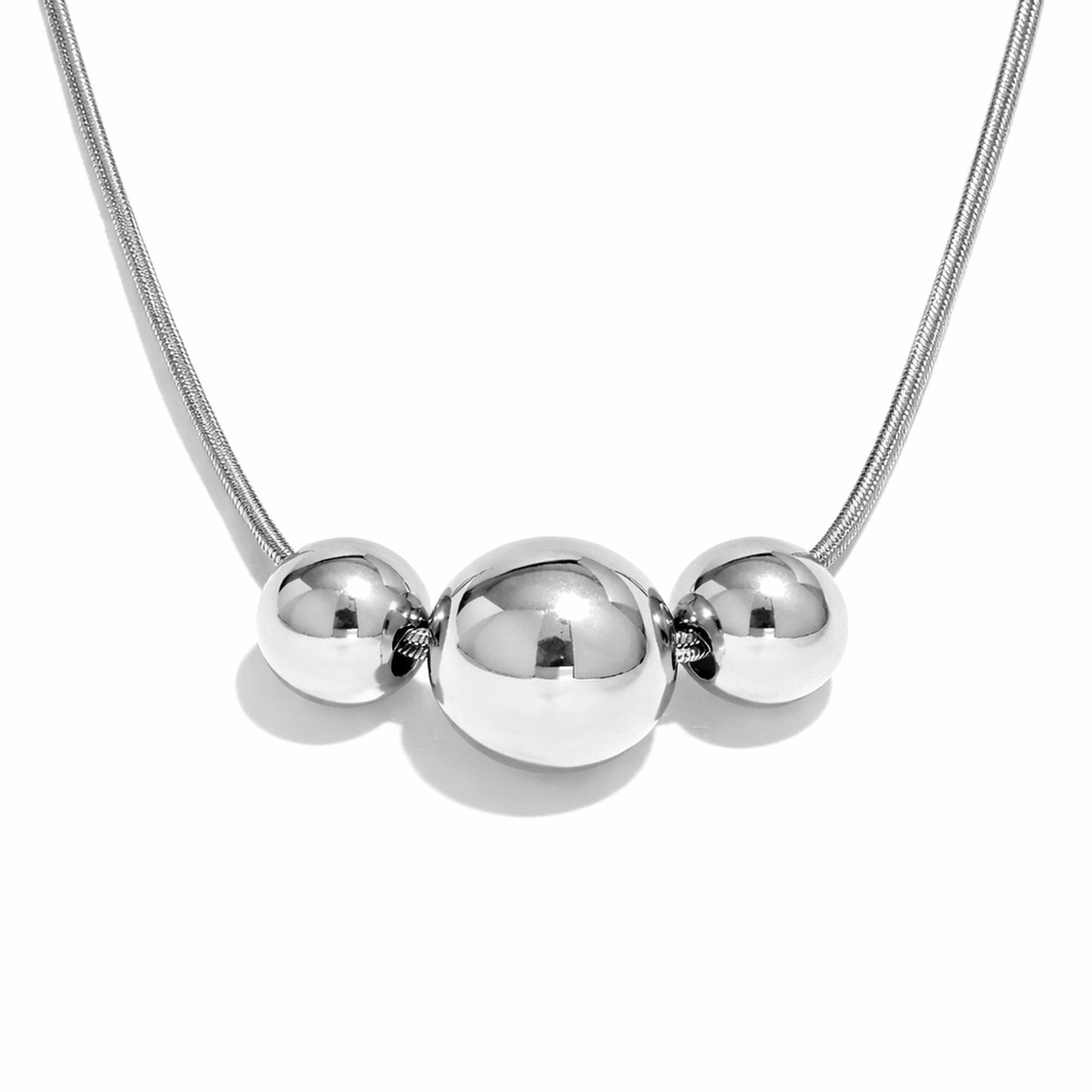 PRO RAY NOVA silver necklace with three spherical beads on white background